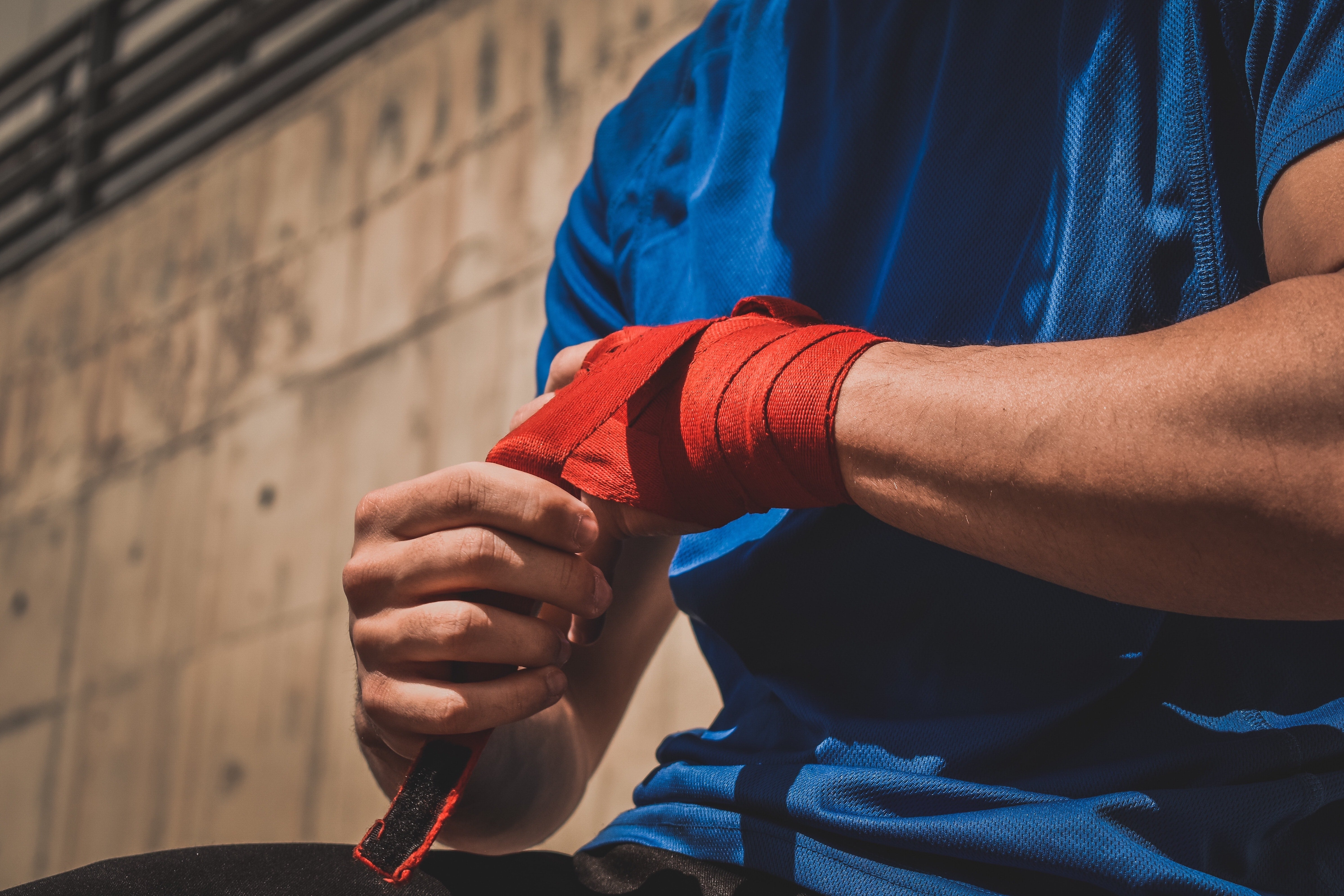 Man wrapping his hand and wrist