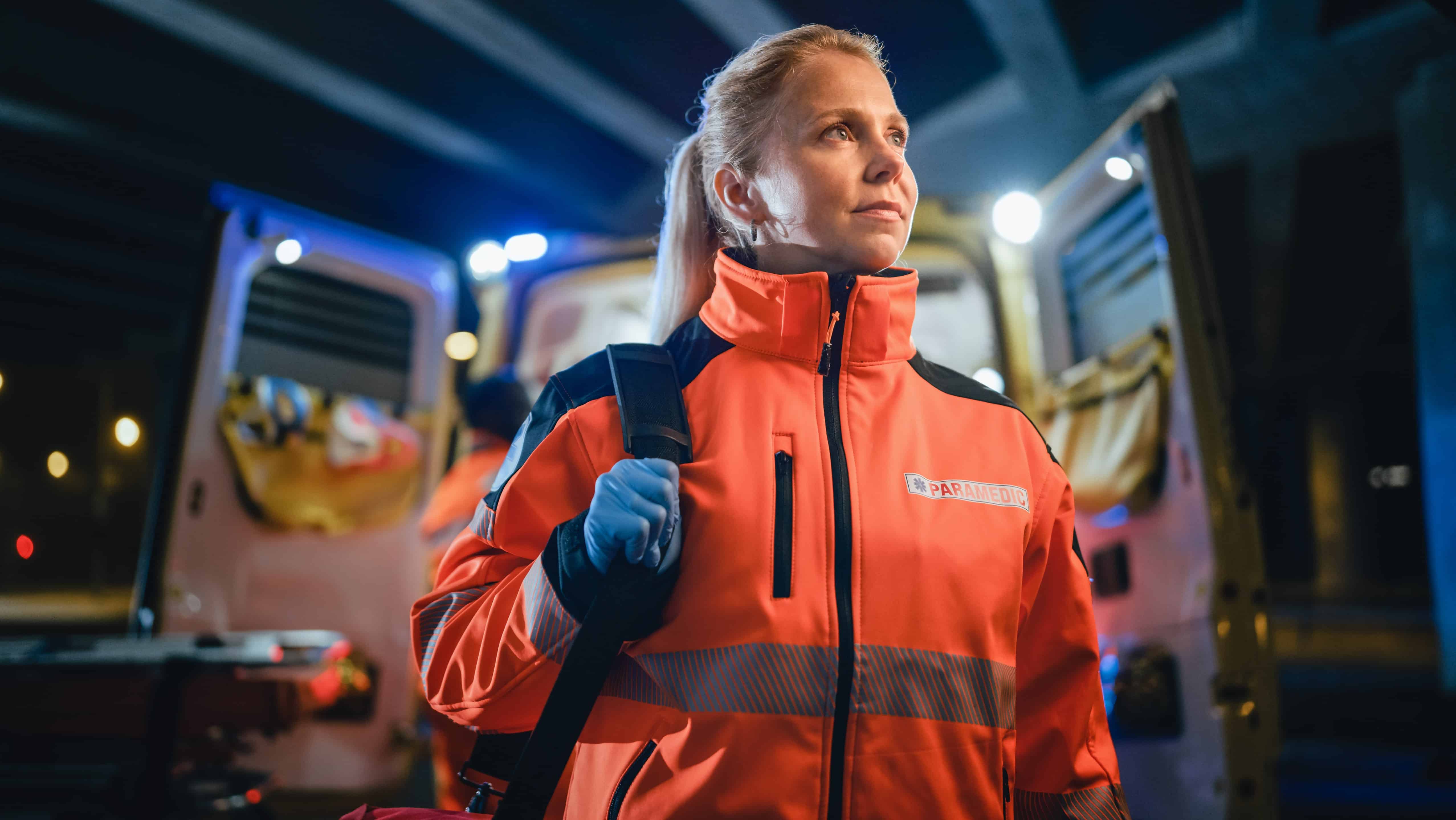 Female paramedic looking off in the distance